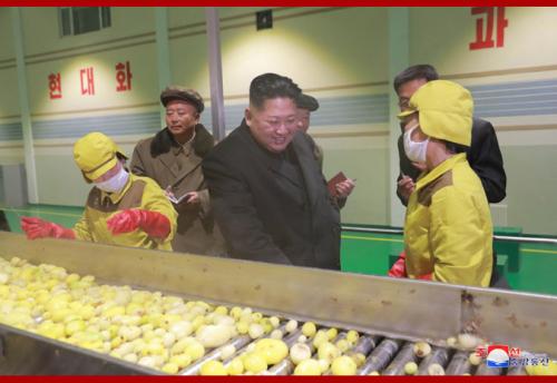 Kim Jong Un at a factory in Samjiyon