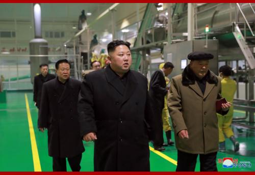 Kim Jong Un at a factory in Samjiyon